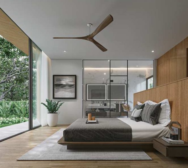 Botanica Four Seasons — master bedroom with a wooden accent wall