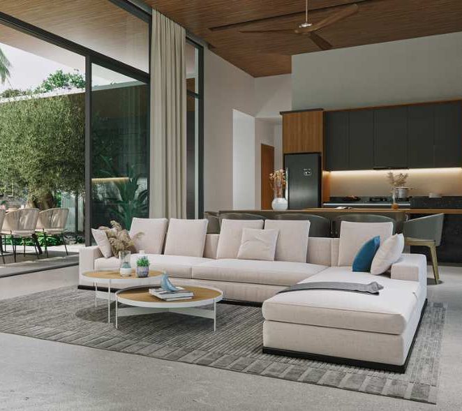 Botanica Four Seasons — open-plan living room with a corner sofa and kitchen
